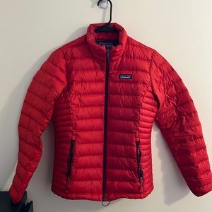 Womens small red/orange Patagonia down jacket